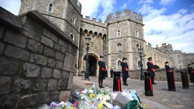 Flowers left outside Windsor Castle, Berkshire, following the announcement of the death of the Duke of Edinburgh at the age of 99. Picture date: Friday April 9, 2021.